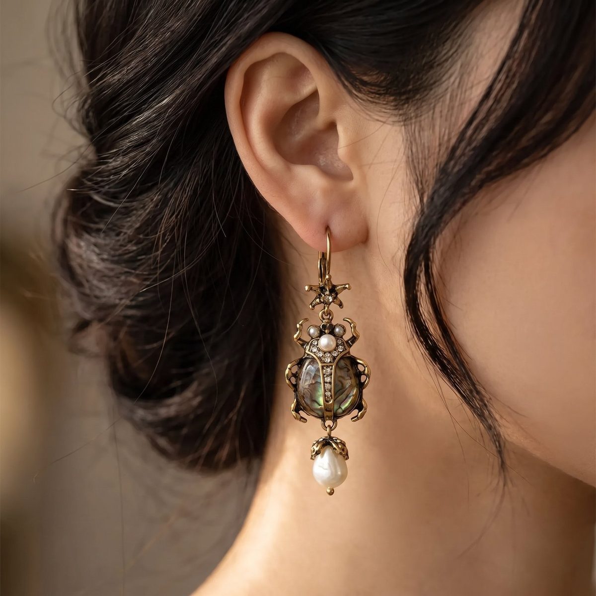 Antique Brass Scarab Pearl Drop Earrings on model